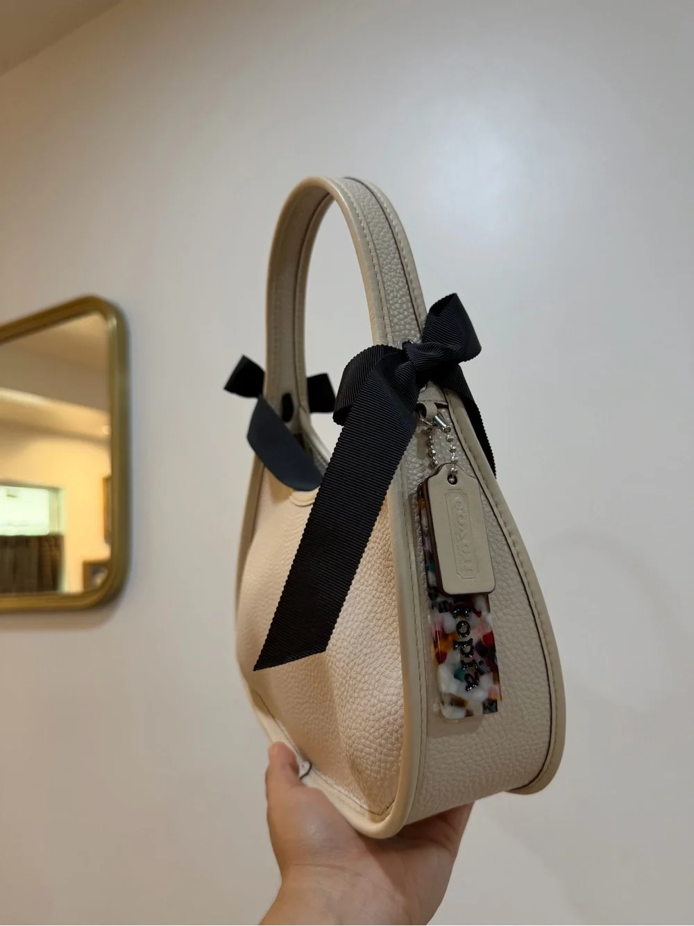 Coach Cream Pebbled Leather Mini Top-Handle Bag with Black Ribbon